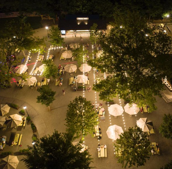 Overhead view at night of the 8-acre biergarten at Olde Mecklenburg Brewery