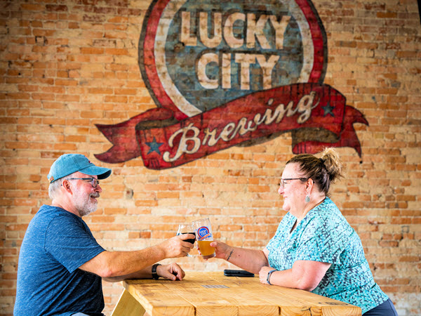 A couple relax at Lucky City Brewing in Reidsville NC