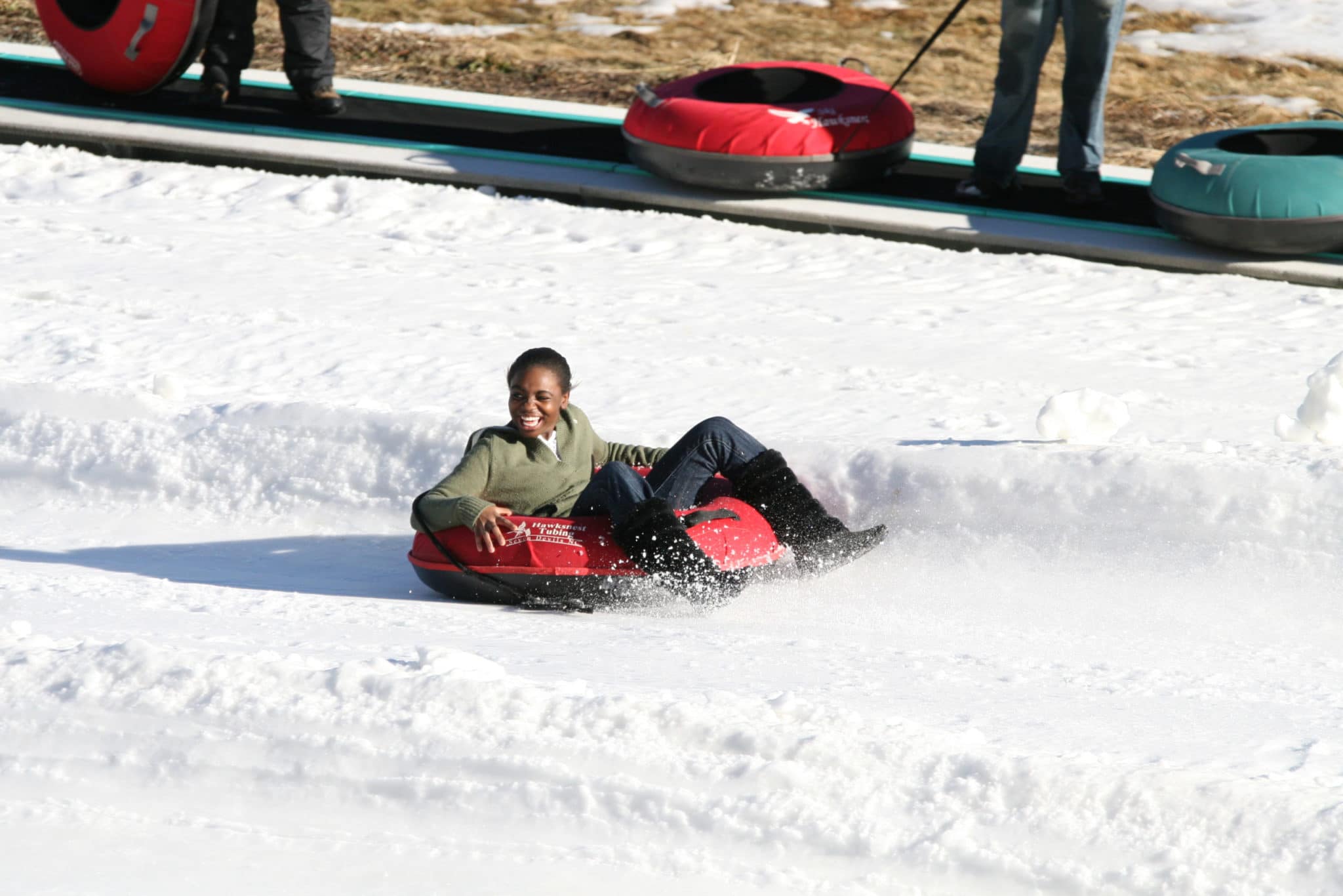Young girl enjoying snowtubing in NC