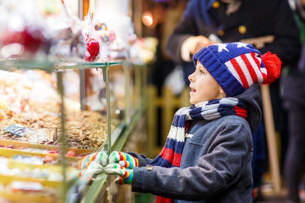 Boy selecting holiday sweets at a Christmas Tree Farm
