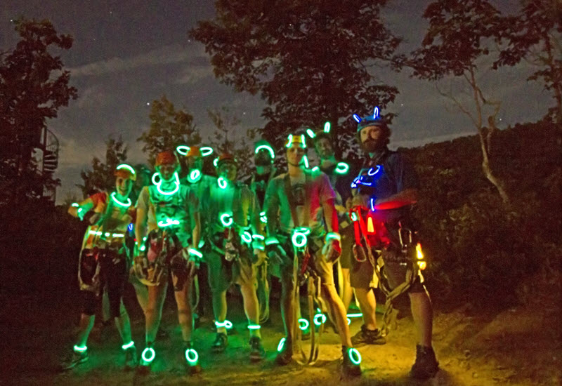 Bryson City moonlight zipline riders wearing glow sticks