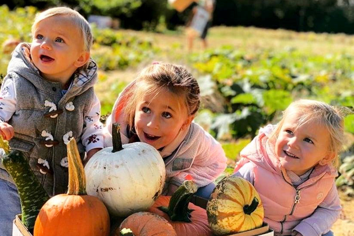 Young children at an NC pumpkin patch