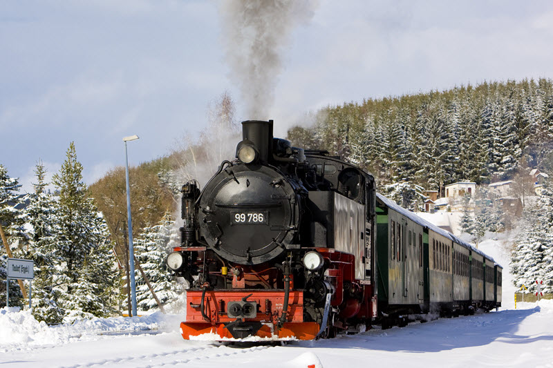 steam train rolls through the snow -- get free Polar Express tickets online