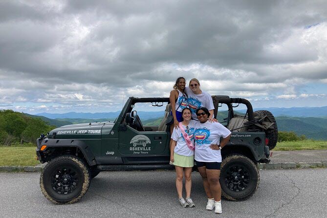 Four women pose with their Jeep on the Blue Ridge Parkway