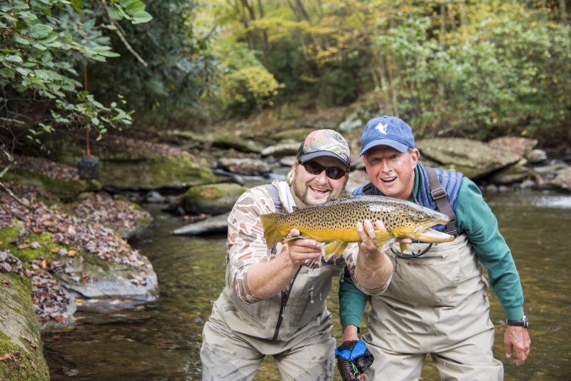 Two men enjoying the ultimate Father's Day excursion at Chetola Resort