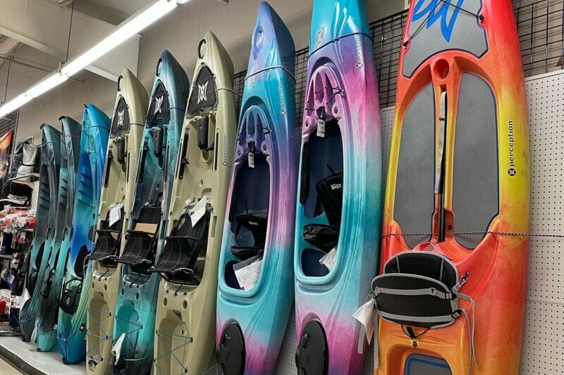 Kayaks on a shelf at Cook's Outdoors