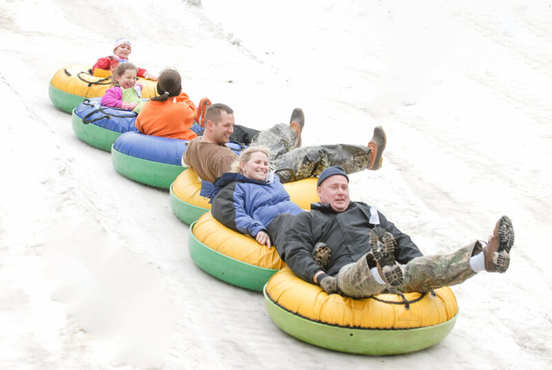 If you're searching "snow tubing near me" in NC, check out Moonshine Mountain!