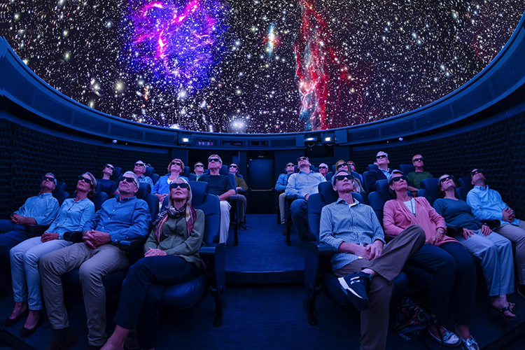 People in the audience at Ingram Planetarium
