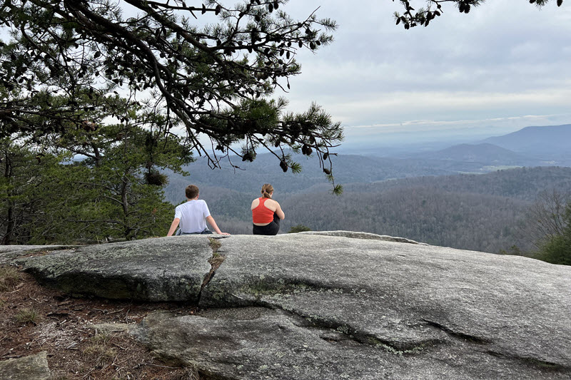 Boy and girl take in the view from Stone Mountain, NC