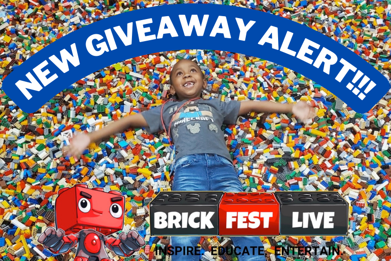 Young boy atop a sea of LEGO bricks