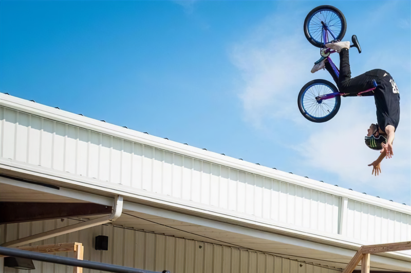 Someone doing a BMX stunt on a ramp at DDASC