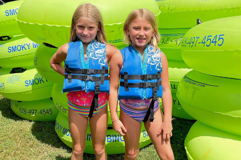 Twins going tubing on the Oconaluftee River