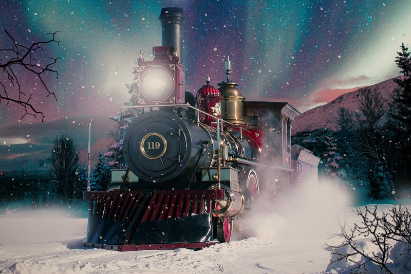 A dreamy Christmas train chugs through snow