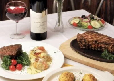A table set with wine and steak at Angelo's in Myrtle Beach, SC.
