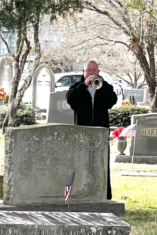 A bugler plays taps at the Wreaths Across America service in Concord, NC.