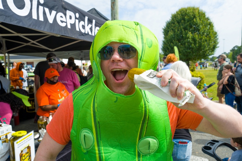 Man in a pickle costume at the NC Pickle Festival