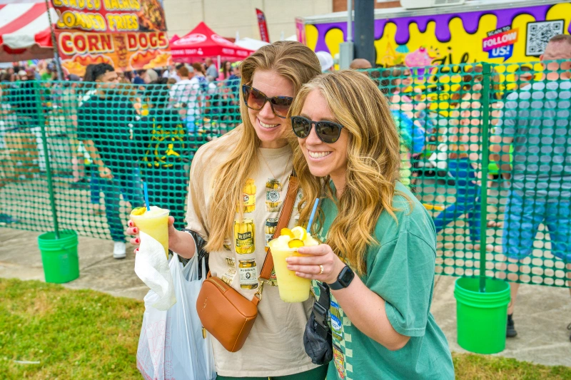 Women at the NC Pickle Festival enjoy pickle slushies