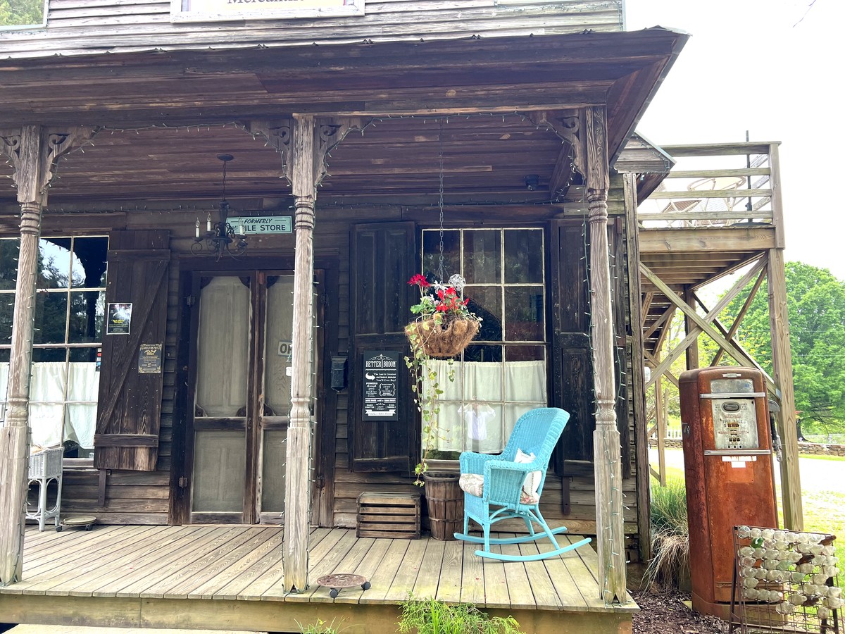 Baby blue rocking chair on a front porch